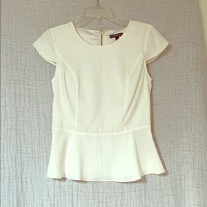 Back zipped white plum top